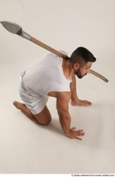 ATILLA KNEELING POSE WITH SPEAR